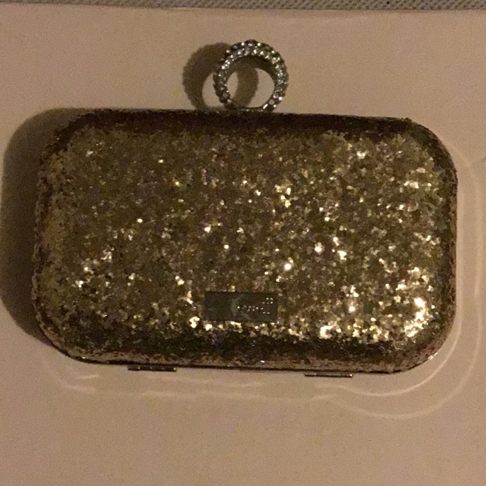 Gold sparkles clutch